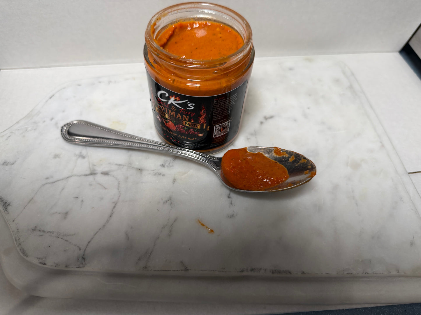 The Signature PIMAN authentic Haitian cooking paste.